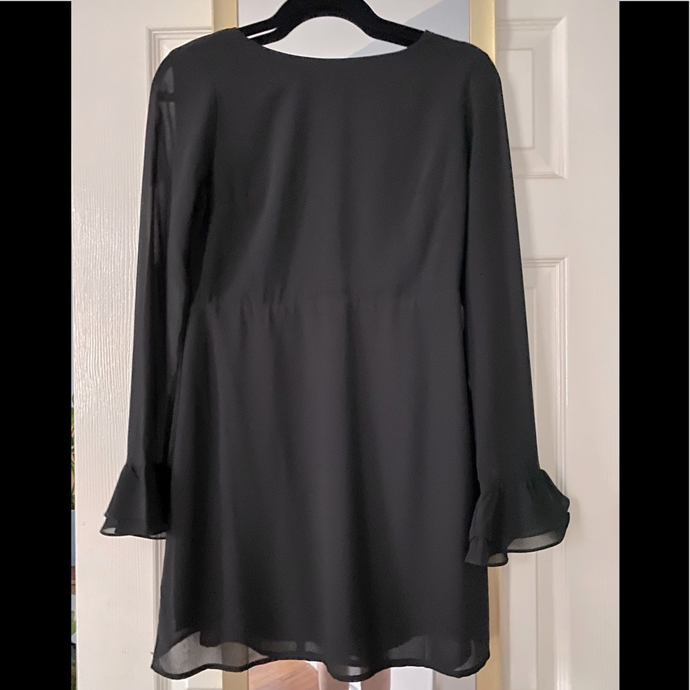 Perfect condition; black short dress, see-through sleeves; XS